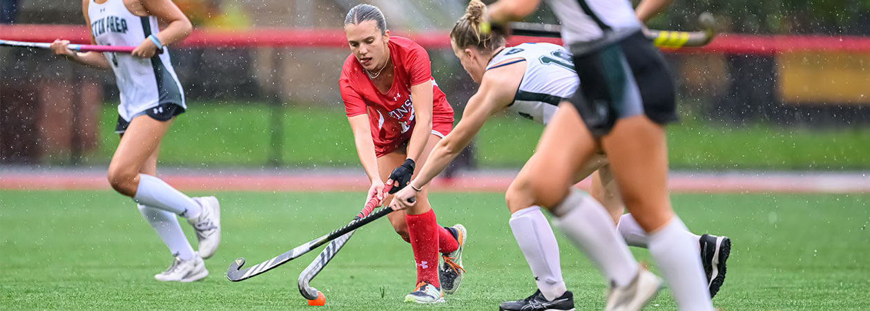 The Winsor School field hockey team competing on field