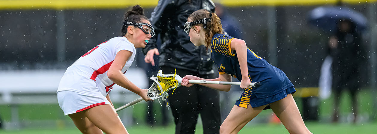 girls playing lacrosse at the Winsor School