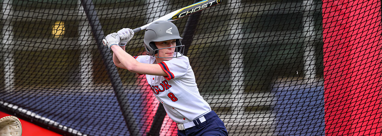 The Winsor School student up to bat at Softball game