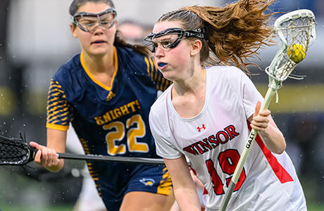 girls playing on lacrosse team