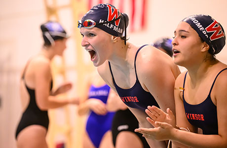 The Winsor School swimming team cheering