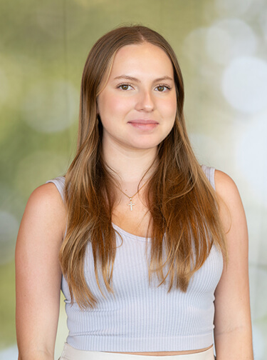 female student with long light brown hair