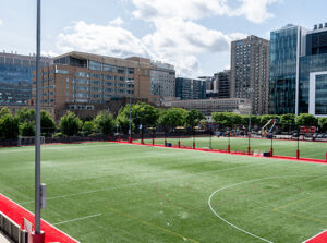 turf soccer fields with red boarder