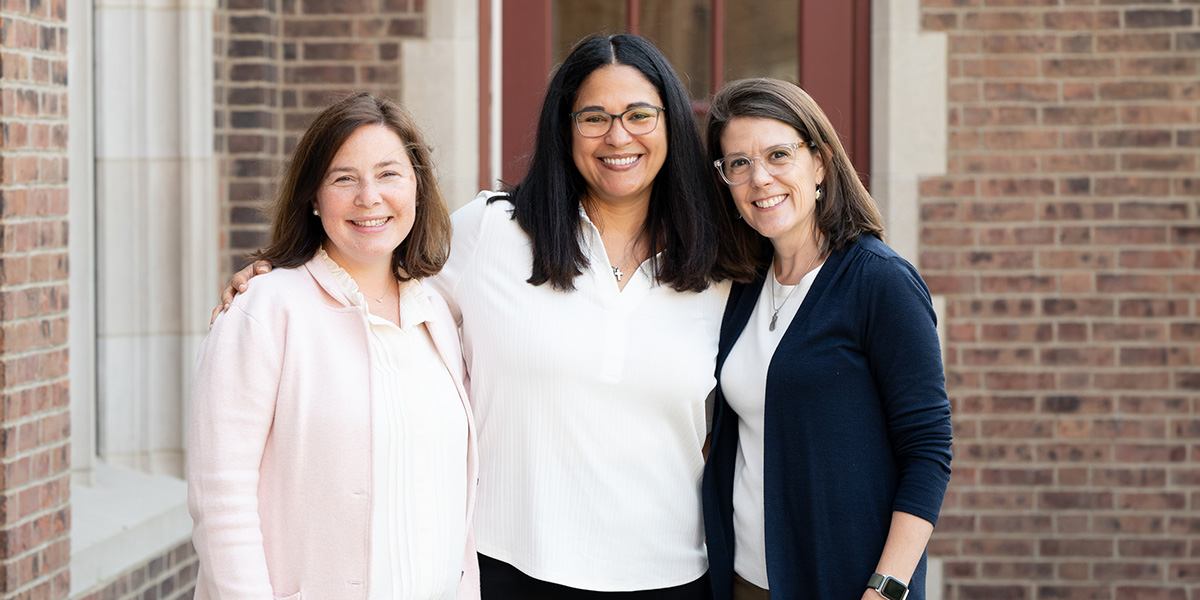 three women posing for a photo