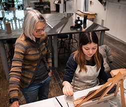 high school girl at private school in art class